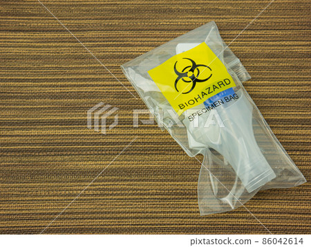 The Antigen Test Kit in biohazard garbage for medical or sci concept The Antigen Test Kit in biohazard garbage for medical or sci concept 86042614
