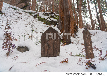 Stone Buddha statue at Yamadera Winter snow scene (Yamagata City, Yamagata Prefecture) 86042682
