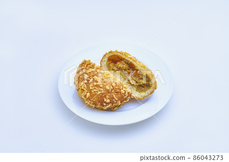 Curry bread on the plate 86043273
