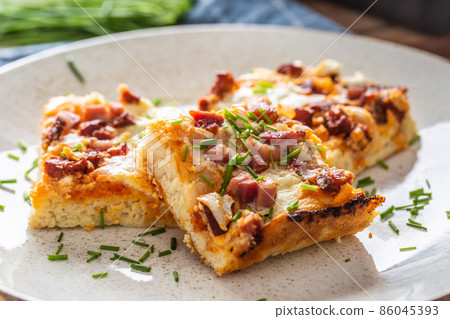 Slovak national dish podpecnik, podplamennik or posuch. Slovak national dish is made sourdough, bryndza, sour cream, bacon and onion Slovak national dish podpecnik, podplamennik or posuch. Slovak national dish is made sourdough, bryndza, sour cream, bacon and onion 86045393