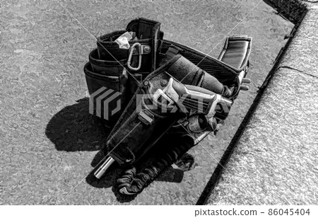 What initially looks like a gun in a holster, is in reality a special wrench tool. What initially looks like a gun in a holster, is in reality a special wrench tool. 86045404