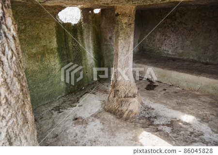 Inside of cave room in cave city Chufut-Kale in Bakhchysarai, Crimea Inside of cave room in cave city Chufut-Kale in Bakhchysarai, Crimea 86045828