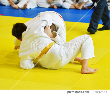 Boys compete in Judo 86047364