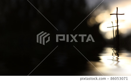 The holy cross of Jesus Christ by the calm waters and waves and space for text on a black background 86053071