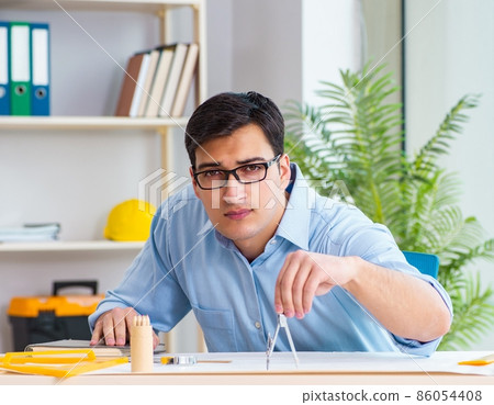 Construction engineer working on new project 86054408