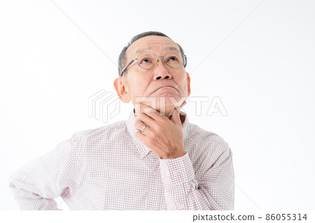 Senior man worries and thinks Senior man worries and thinks 86055314