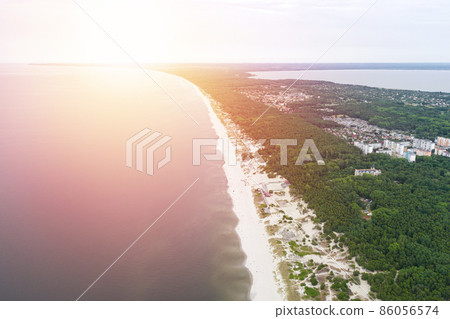 Baltic coastline with green summer forest and the sea. Baltiysk beach. Aerial view 86056574