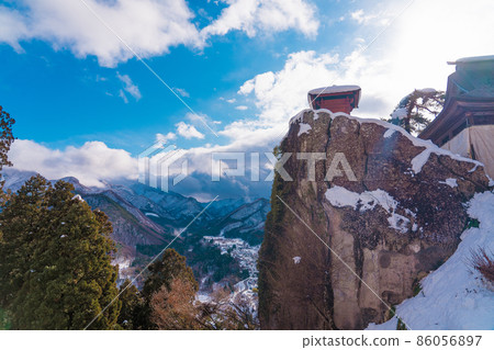 Yamadera Hyakujoiwa and Nakkyodo Winter Snowscape (Yamagata City, Yamagata Prefecture) 86056897