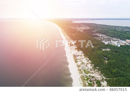 Baltic coastline with green summer forest and the sea. Baltiysk beach. Aerial view 86057015