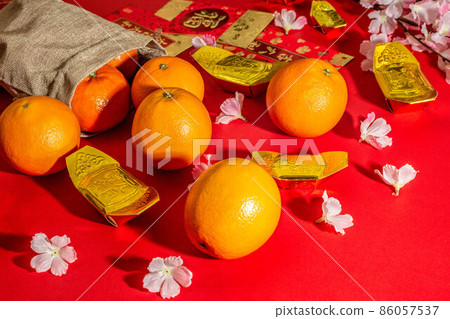Flat lay mockup for holiday Chinese new year red packet and gold accessories blossom and Lunar festival background, means wealthy or rich and happiness. Flat lay mockup for holiday Chinese new year red packet and gold accessories blossom and Lunar festival background, means wealthy or rich and happiness. 86057537