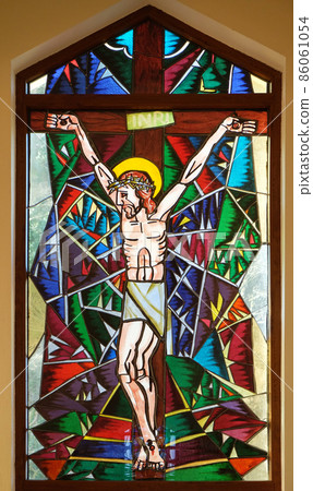 Crucifixion, stained glass window in Memorial Church of the Passion of Jesus in Macelj, Croatia 86061054