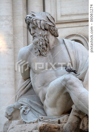 Piazza Navona, Fountain of the Four Rivers detail showing the river-god Ganges by Gian Lorenzo Bernini, Rome, Italy 86061274