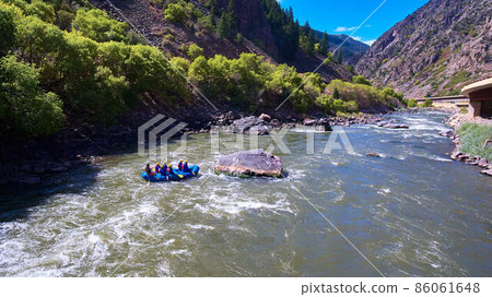 Colorado river water rafting in mountains 86061648