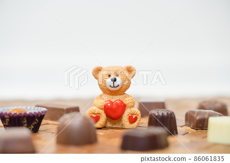 Valentine's image material of cute bear and bite-sized chocolate 86061835