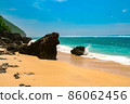 Beach on the tropical island. Clear blue water, sand and stones 86062456
