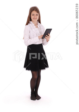 Beautiful young woman holding digital tablet Beautiful young woman holding digital tablet 86065159