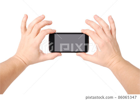 Man hand holding the smartphone 86065347