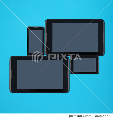 Tablet pc and smartphone lying side by side Tablet pc and smartphone lying side by side 86065362