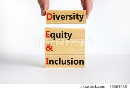 DEI, Diversity, equity and inclusion symbol. Concept words DEI, diversity, equity and inclusion on wooden cubes on beautiful white background. Business, DEI, diversity, equity and inclusion concept. 86065686