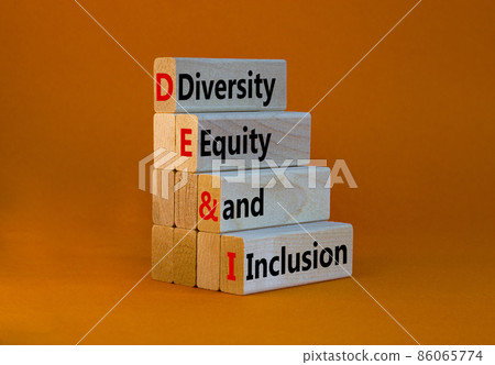 DEI, Diversity, equity and inclusion symbol. Concept words DEI, diversity, equity and inclusion on wooden blocks on beautiful orange background. Business, DEI, diversity, equity and inclusion concept. 86065774