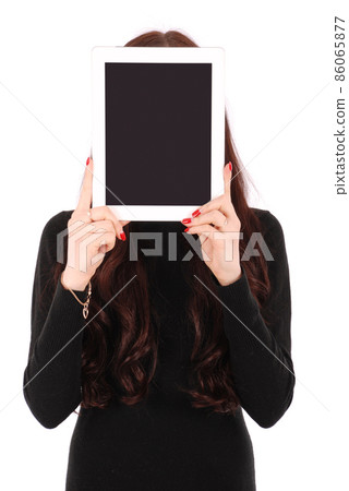 Girl keeps tablet pc the face 86065877