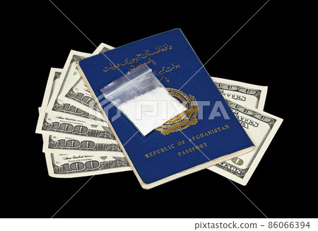 Package with drug over the Afghan passport and american dollars Package with drug over the Afghan passport and american dollars 86066394