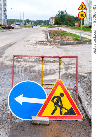 Road works traffic sign at the city street Road works traffic sign at the city street 86066403