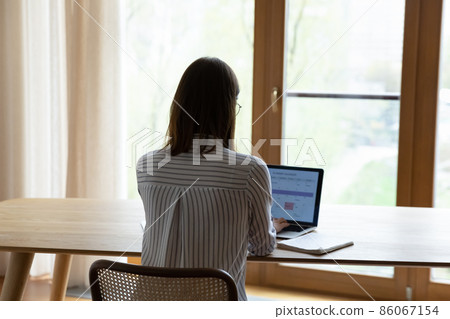 Business woman working at home office workplace table Business woman working at home office workplace table 86067154