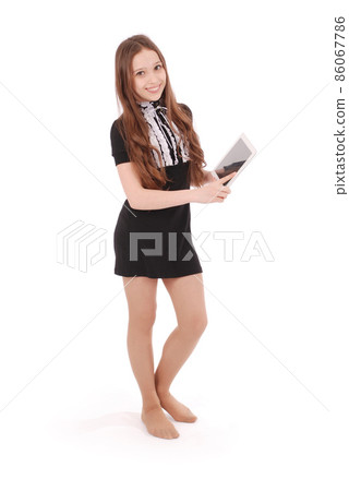 Smiling student teenage girl showing a tablet display application 86067786