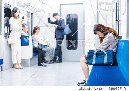 High school girl suffering from abdominal pain on the train 86069743