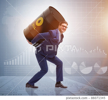 Businessman under the burden of oil barrel 86071345