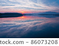 Beautiful Nature Background.Amazing Colorful Clouds.Water Reflections.Magic Artistic Wallpaper.Creative Photography.Blue Sky and Sunset.Mountain Landscape.Tranquil Panorama.Sun and Lake.Blue Color. 86073208