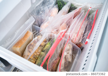 Frozen stock of various ingredients in the refrigerator 86073362