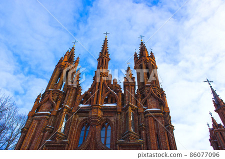 Beautiful Gothic Style St. Anne Church in VIlnius, Lithuania on a Beautiful winter Day Beautiful Gothic Style St. Anne Church in VIlnius, Lithuania on a Beautiful winter Day 86077096