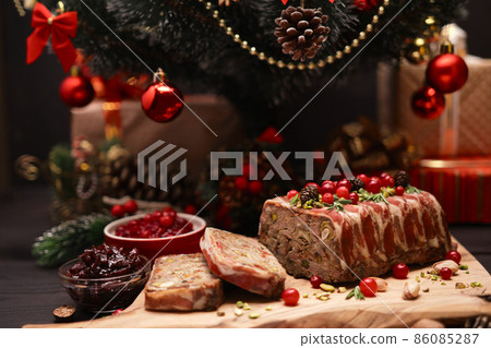 Traditional French terrine covered with bacon and decorated Christmas tree Traditional French terrine covered with bacon and decorated Christmas tree 86085287