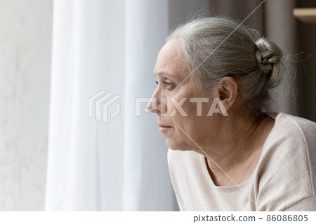 Stressed unhappy old woman thinking of problems at home. 86086805