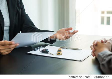 The car dealer provides advice on loans, insurance details, and car rental information, and delivers the car with the keys after the rental contract is signed 86088346