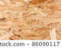 Wood texture. Osb wood board for background decoration. OSB board texture. Brown wooden background. 86090117