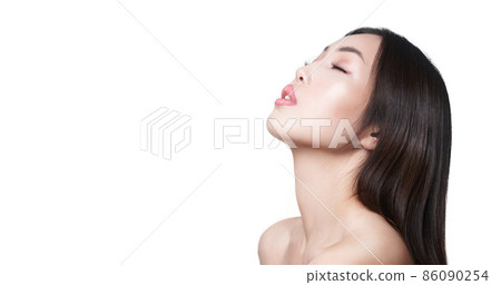 A young Asian woman with healthy skin on an isolated white background with space to copy. A brunette with closed eyes and long hair. High quality photo A young Asian woman with healthy skin on an isolated white background with space to copy. A brunette with closed eyes and long hair. High quality photo 86090254