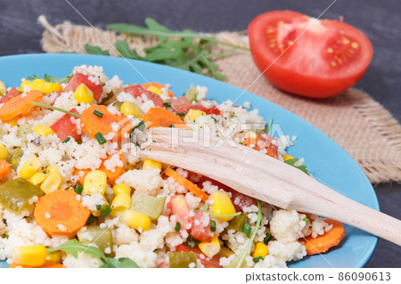 Fresh salad with couscous and vegetables as best nutritious food for dieting and slimming Fresh salad with couscous and vegetables as best nutritious food for dieting and slimming 86090613