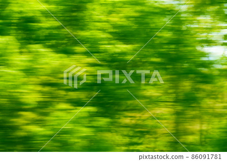 A green landscape full of speed, flowing light A green landscape full of speed, flowing light 86091781