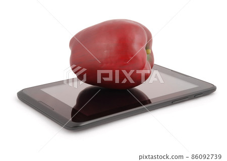 Red apple on a tablet PC (Clipping path) Red apple on a tablet PC (Clipping path) 86092739