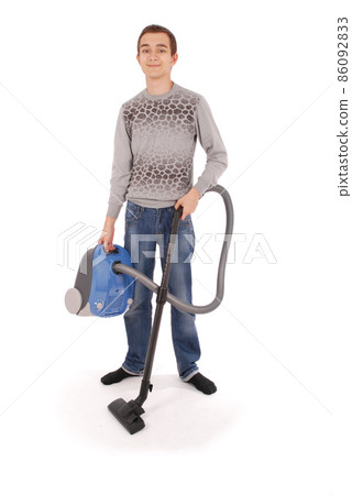 Boy with vacuum cleaner 86092833