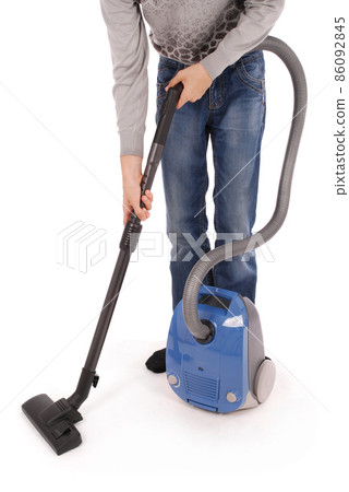 Boy with vacuum cleaner Boy with vacuum cleaner 86092845