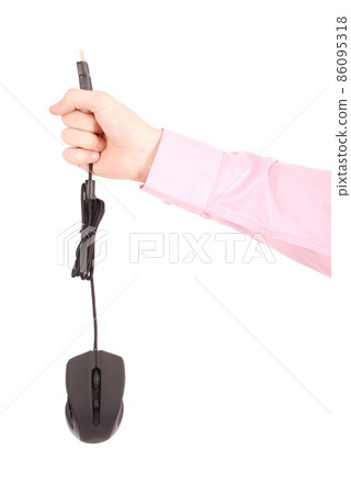 Man holds in his hand black computer optical mouse 86095318
