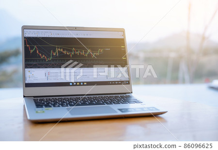 Cryptocurrency price chart on digital exchange on Laptop Cryptocurrency price chart on digital exchange on Laptop 86096625