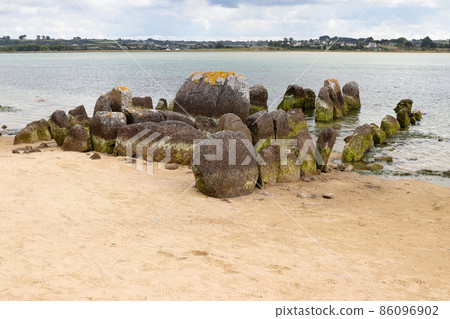 Ruins of the Dolmen of Guinirvit, Bay of Kernic, Plouescat, Finistere, Brittany, France Ruins of the Dolmen of Guinirvit, Bay of Kernic, Plouescat, Finistere, Brittany, France 86096902