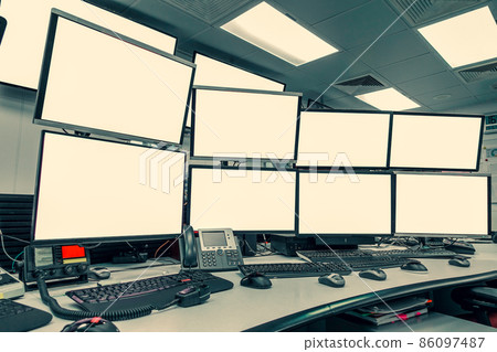 group of blank monitors and screen on security desk or control room for monitor process or stock data trading group of blank monitors and screen on security desk or control room for monitor process or stock data trading 86097487