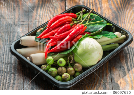 Tom kha ingredients set for Thai cooking in black pallet on wooden table 86097650