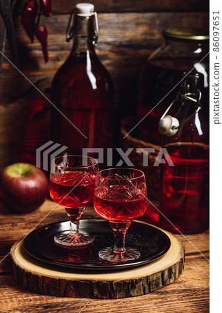 Two glasses of berry nalivka Two glasses of berry nalivka 86097651